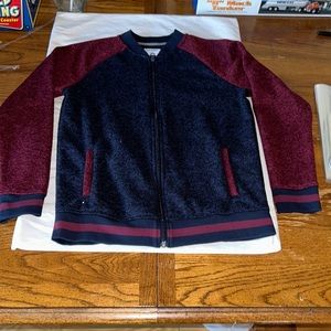 Kids, Old Navy size extra large, which is a 14/15. Burgundy and dark blue Jacket